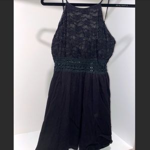 Short black dress with lace top